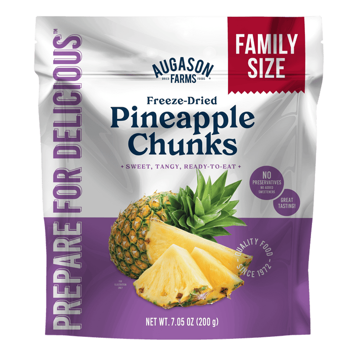 Augason Farms Freeze Dried Pineapple Chunks Family Size Pouch, 20 servings. Made with 100% real pineapple. Net weight 7.05 oz (200g). Features images of whole and sliced pineapple on the packaging—enjoy anytime!.