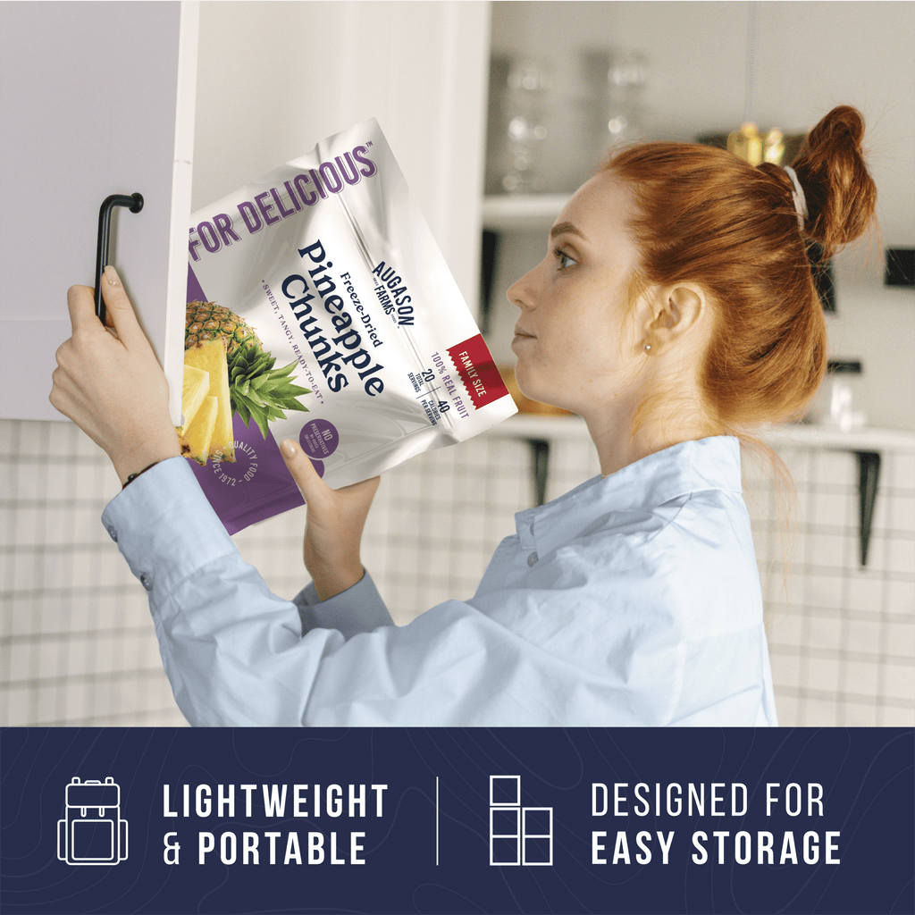 A woman places a pouch of Augason Farms Freeze Dried Pineapple Chunks Family Size, 20 Servings, into a cabinet. Text highlights the product’s lightweight, portable design and easy storage.
